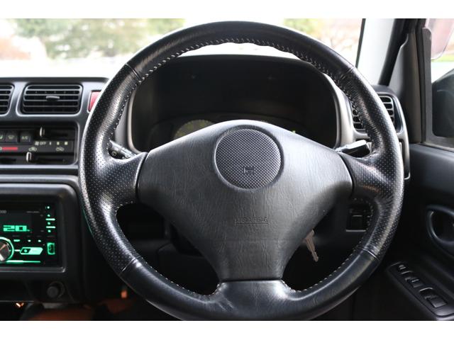 ジムニー ランドベンチャー　５速マニュアル　走行距離３５０００キロ　キーレス　４ＷＤ　ハーフレザーシート　タイミングチェーン　１６インチアルミ　グローブグリーン（12枚目）