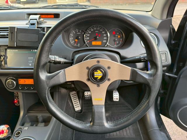 スイフト スポーツ　／５速マニュアル／ナビ／ワンセグＴＶ／社外サスペンション／社外マフラー／ゼロチャンバー／社外アルミホイール／サブウーファー／ＭＯＭＯステ／ドライブレコーダー前後／ＥＴＣ／（14枚目）