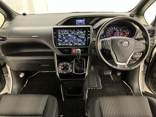 ヴォクシー ＺＳ　煌　地上デジタル　ＴＳＳ　両側パワードア　アイドリングストップ車　パワーウィンド　横滑防止　１オーナ　整備記録簿　ＤＶＤ可　盗難防止装置　スマートエントリー　Ｂカメラ　ＡＵＸ　ＬＥＤヘッドライト　ＥＴＣ（5枚目）