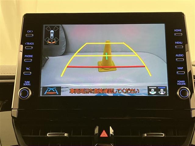カローラツーリング ハイブリッド ダブルバイビー 追突軽減ブレーキ バックモニタ 横滑防止 スマキー LEDライト デュアルエアバッグ エアコン オートクルーズ サイドエアバッグ ETC付 ナビ PS キーフリー ABS エアバック メモリ-ナビ(7枚目)