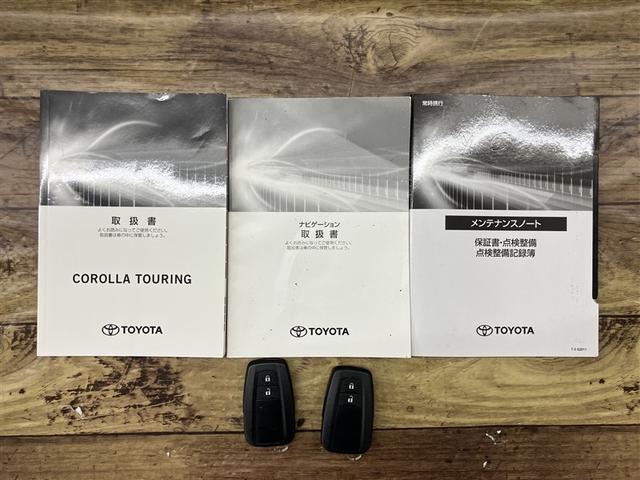カローラツーリング ハイブリッド ダブルバイビー 追突軽減ブレーキ バックモニタ 横滑防止 スマキー LEDライト デュアルエアバッグ エアコン オートクルーズ サイドエアバッグ ETC付 ナビ PS キーフリー ABS エアバック メモリ-ナビ(20枚目)