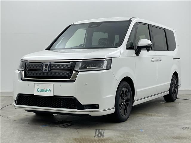 ステップワゴン ｅ：ＨＥＶスパーダ　登録済未使用車　純正１１．４インチナビ　１５．６インチ後席モニター　ハーフレザーシート　シートヒーター　パワーバックドア　ホンダセンシング　衝突軽減ブレーキ　両側パワースライドドア　２列目オットマン（19枚目）