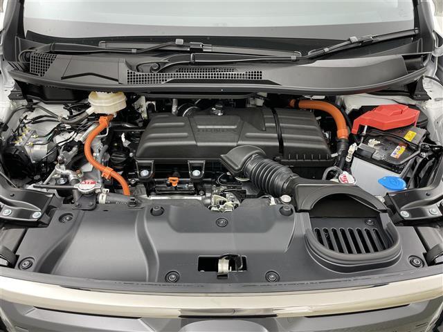 ステップワゴン ｅ：ＨＥＶスパーダ　登録済未使用車　純正１１．４インチナビ　１５．６インチ後席モニター　ハーフレザーシート　シートヒーター　パワーバックドア　ホンダセンシング　衝突軽減ブレーキ　両側パワースライドドア　２列目オットマン（21枚目）