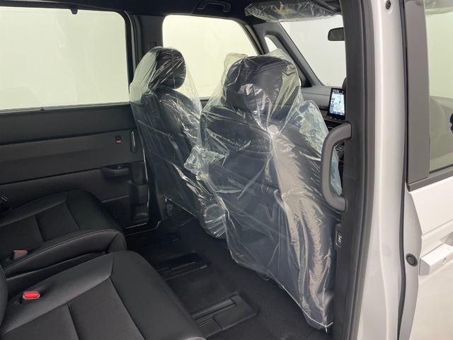 ステップワゴン ｅ：ＨＥＶスパーダ　登録済未使用車　純正１１．４インチナビ　１５．６インチ後席モニター　ハーフレザーシート　シートヒーター　パワーバックドア　ホンダセンシング　衝突軽減ブレーキ　両側パワースライドドア　２列目オットマン（53枚目）