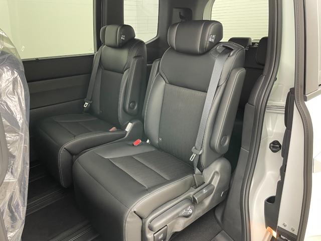 ステップワゴン ｅ：ＨＥＶスパーダ　登録済未使用車　純正１１．４インチナビ　１５．６インチ後席モニター　ハーフレザーシート　シートヒーター　パワーバックドア　ホンダセンシング　衝突軽減ブレーキ　両側パワースライドドア　２列目オットマン（55枚目）