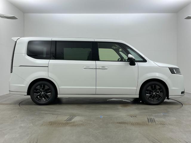 ステップワゴン ｅ：ＨＥＶスパーダ　登録済未使用車　純正１１．４インチナビ　１５．６インチ後席モニター　ハーフレザーシート　シートヒーター　パワーバックドア　ホンダセンシング　衝突軽減ブレーキ　両側パワースライドドア　２列目オットマン（67枚目）
