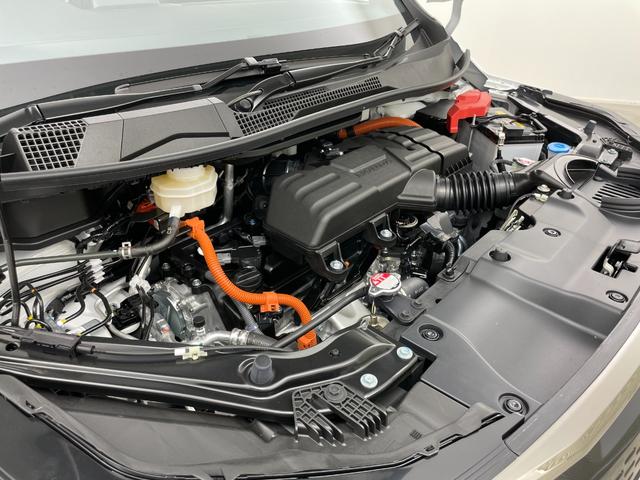 ステップワゴン ｅ：ＨＥＶスパーダ　登録済未使用車　純正１１．４インチナビ　１５．６インチ後席モニター　ハーフレザーシート　シートヒーター　パワーバックドア　ホンダセンシング　衝突軽減ブレーキ　両側パワースライドドア　２列目オットマン（74枚目）