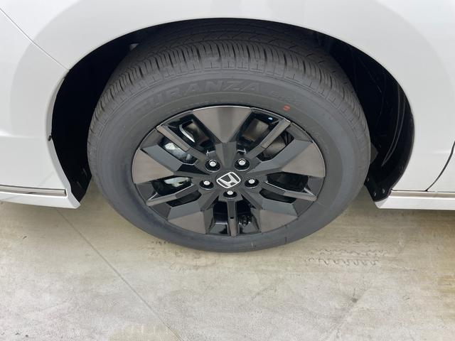 ステップワゴン ｅ：ＨＥＶスパーダ　登録済未使用車　純正１１．４インチナビ　１５．６インチ後席モニター　ハーフレザーシート　シートヒーター　パワーバックドア　ホンダセンシング　衝突軽減ブレーキ　両側パワースライドドア　２列目オットマン（76枚目）