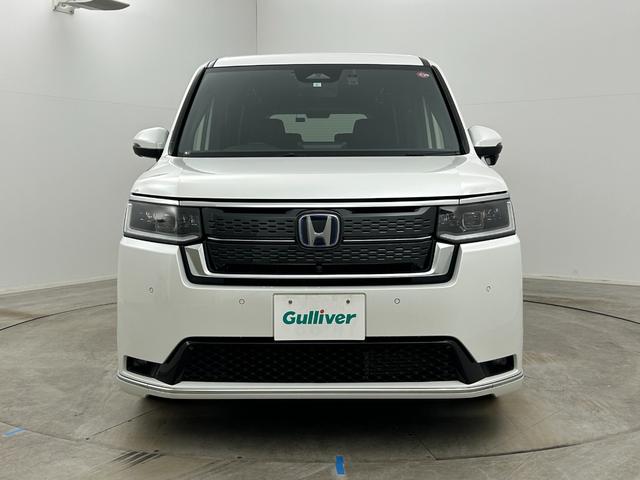 ステップワゴン ｅ：ＨＥＶスパーダ　プレミアムライン　純正１１インチナビ　純正フリップダウンモニター　全方位カメラ　両側パワースライドドア　ＢＳＭ　レーダークルーズコントロール　シートヒーター　ビルトインＥＴＣ２．０　パドルシフト　地デジフルセグＴＶ（61枚目）