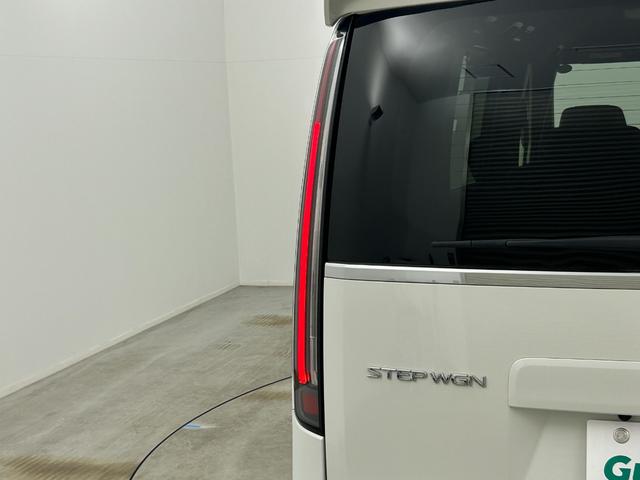 ステップワゴン ｅ：ＨＥＶスパーダ　プレミアムライン　純正１１インチナビ　純正フリップダウンモニター　全方位カメラ　両側パワースライドドア　ＢＳＭ　レーダークルーズコントロール　シートヒーター　ビルトインＥＴＣ２．０　パドルシフト　地デジフルセグＴＶ（72枚目）