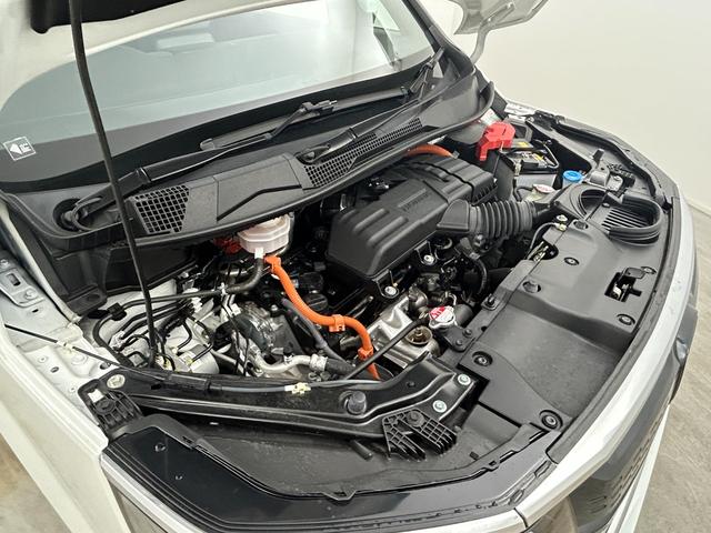 ステップワゴン ｅ：ＨＥＶスパーダ　プレミアムライン　純正１１インチナビ　純正フリップダウンモニター　全方位カメラ　両側パワースライドドア　ＢＳＭ　レーダークルーズコントロール　シートヒーター　ビルトインＥＴＣ２．０　パドルシフト　地デジフルセグＴＶ（74枚目）