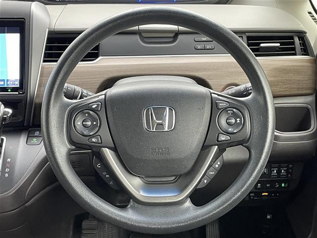 フリード G・ホンダセンシング フリップダウンモニター 純正9インチナビ シートヒーター バックカメラ レーダークルーズコントロール 両側パワースライドドア 衝突軽減ブレーキ フルセグTV Bluetooth ビルトインETC(27枚目)