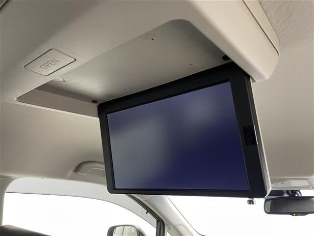 エルグランド 250ハイウェイスターS 純正10インチナビ 純正12.1インチ後席モニター 全方位カメラ 両側パワスラ コーナーセンサー 電動リアゲート オットマン ハーフレザーシート LEDヘッドライト フォグランプ オートハイビーム(4枚目)