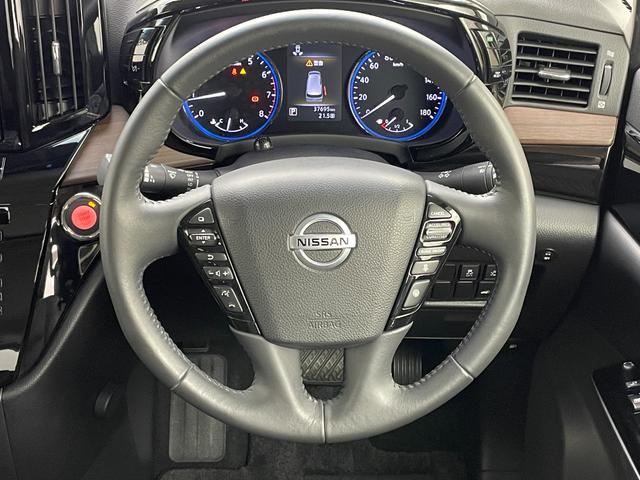 エルグランド 250ハイウェイスターS 純正10インチナビ 純正12.1インチ後席モニター 全方位カメラ 両側パワスラ コーナーセンサー 電動リアゲート オットマン ハーフレザーシート LEDヘッドライト フォグランプ オートハイビーム(44枚目)