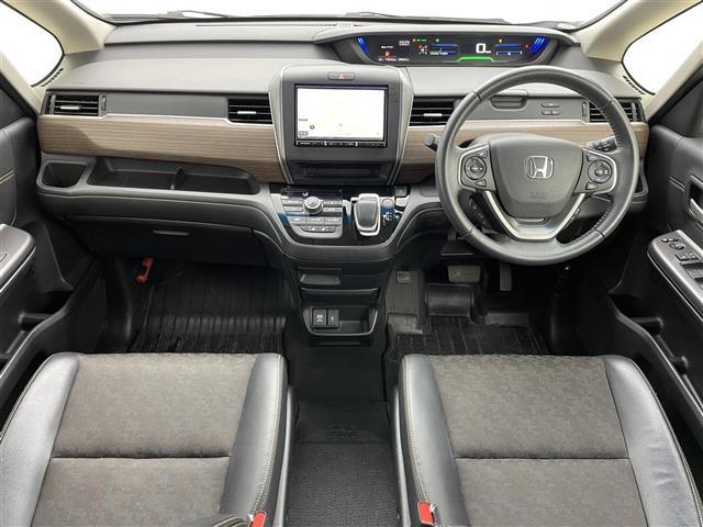 フリードハイブリッド ハイブリッド・クロスターホンダセンシング　８インチナビ　フリップダウンモニター　両側パワースライドドア　衝突軽減ブレーキ　レーダークルーズコントロール　ドライブレコーダー　シートヒーター　バックカメラ　ビルトインＥＴＣ　ＬＥＤヘッドライト（12枚目）