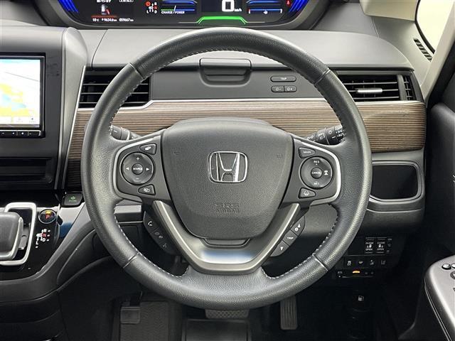 フリードハイブリッド ハイブリッド・クロスターホンダセンシング　８インチナビ　フリップダウンモニター　両側パワースライドドア　衝突軽減ブレーキ　レーダークルーズコントロール　ドライブレコーダー　シートヒーター　バックカメラ　ビルトインＥＴＣ　ＬＥＤヘッドライト（24枚目）