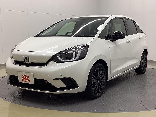 フィット ｅ：ＨＥＶホーム　２０周年特別仕様車　カーサ　ドライブレコーダー　バックカメラ　ナビ　ＴＶ　クリアランスソナー　オートクルーズコントロール　レーンアシスト　衝突被害軽減システム　アルミホイール　オートライト　ＬＥＤヘッドランプ　スマートキー（12枚目）