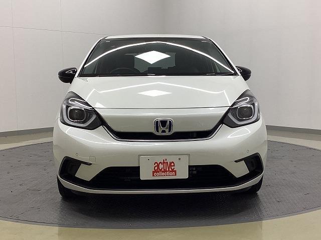 フィット ｅ：ＨＥＶホーム　２０周年特別仕様車　カーサ　ドライブレコーダー　バックカメラ　ナビ　ＴＶ　クリアランスソナー　オートクルーズコントロール　レーンアシスト　衝突被害軽減システム　アルミホイール　オートライト　ＬＥＤヘッドランプ　スマートキー（13枚目）