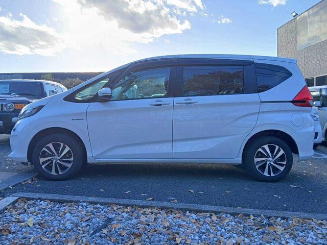 フリード+ハイブリッド ハイブリッドG・ホンダセンシング Sパッケージ/純正ナビ/バックモニター/寒冷地/4WD/両側電動スライド(2枚目)