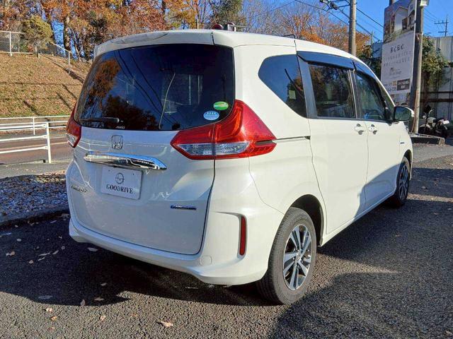 フリード+ハイブリッド ハイブリッドG・ホンダセンシング Sパッケージ/純正ナビ/バックモニター/寒冷地/4WD/両側電動スライド(3枚目)