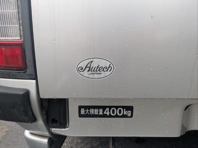 ダットサンピックアップ ダブルキャブ　スカイスター　オーテック　オーテック架装・５ＭＴ車・ＥＴＣ・ハードキャノビー・メッキホイール（12枚目）