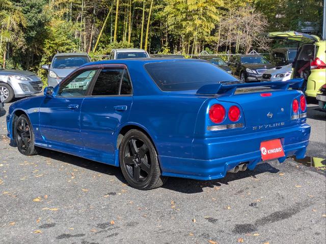 スカイライン ＧＴスペシャルエディション　アルティアエアロ・サイド　リアエアロ・Ｒスポイラー・ハイキャスレス車・社外ＡＷ・ＭＯＭＯディープコーン・ＫＥＮＷＯＯＤデジタルインナーミラー・ＫＥＮＷＯＯＤ　Ｐナビ・オールペン車両・ＥＴＣ（3枚目）