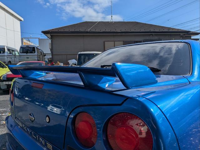 スカイライン ＧＴスペシャルエディション　アルティアエアロ・サイド　リアエアロ・Ｒスポイラー・ハイキャスレス車・社外ＡＷ・ＭＯＭＯディープコーン・ＫＥＮＷＯＯＤデジタルインナーミラー・ＫＥＮＷＯＯＤ　Ｐナビ・オールペン車両・ＥＴＣ（12枚目）