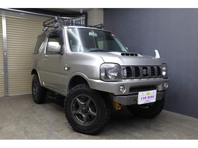 ジムニー ランドベンチャー　ワンオーナー　ＭＴ５速　アピオＴＳ７カスタム　２インチアップ　社外サスペンション　　静香午前マフラー　ＷＩＬＤＢＯＡＲ　Ｘ１６インチＡＷ　牽引フック　純正ナビ・ＴＶ　ＥＴＣ　ハーフ革　シートヒーター（7枚目）