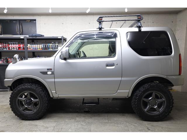 ジムニー ランドベンチャー　ワンオーナー　ＭＴ５速　アピオＴＳ７カスタム　２インチアップ　社外サスペンション　　静香午前マフラー　ＷＩＬＤＢＯＡＲ　Ｘ１６インチＡＷ　牽引フック　純正ナビ・ＴＶ　ＥＴＣ　ハーフ革　シートヒーター（10枚目）