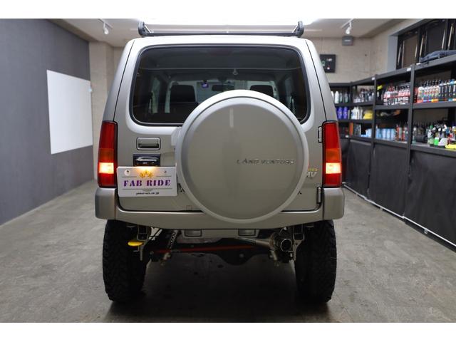 ジムニー ランドベンチャー　ワンオーナー　ＭＴ５速　アピオＴＳ７カスタム　２インチアップ　社外サスペンション　　静香午前マフラー　ＷＩＬＤＢＯＡＲ　Ｘ１６インチＡＷ　牽引フック　純正ナビ・ＴＶ　ＥＴＣ　ハーフ革　シートヒーター（13枚目）
