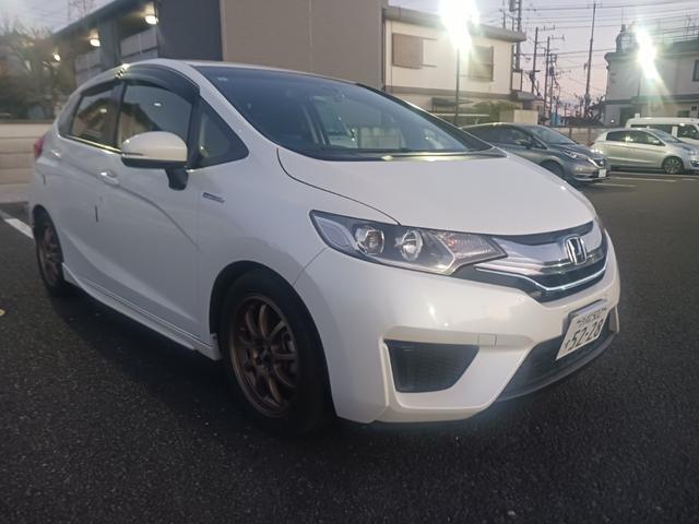 フィットハイブリッド Ｌパッケージ　ローダウン　社外アルミホイール　ナビ　バックカメラ　ＥＴＣ（18枚目）