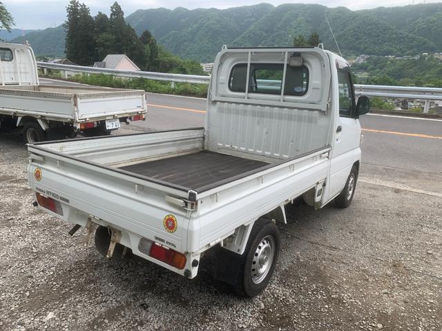 ＮＴ１００クリッパートラック ＤＸ　パワステ　４ＷＤ　５ＭＴ　３方開　エアコン（4枚目）