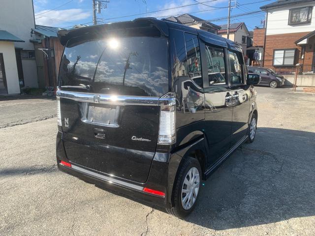 N-BOXカスタム G・Lパッケージ アイドリングストップ車 スマキ- フロントベンチシート パワーウィンドウ 盗難防止システム オートエアコン パワステ キーレスエントリー 両席エアバック ABS 横滑り防止 運転席エアバック(3枚目)