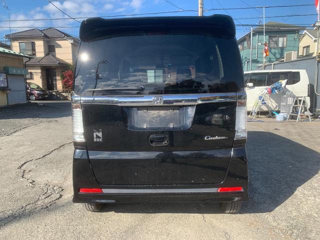 N-BOXカスタム G・Lパッケージ アイドリングストップ車 スマキ- フロントベンチシート パワーウィンドウ 盗難防止システム オートエアコン パワステ キーレスエントリー 両席エアバック ABS 横滑り防止 運転席エアバック(4枚目)