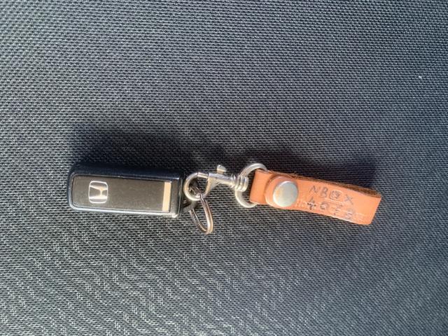 N-BOXカスタム G・Lパッケージ アイドリングストップ車 スマキ- フロントベンチシート パワーウィンドウ 盗難防止システム オートエアコン パワステ キーレスエントリー 両席エアバック ABS 横滑り防止 運転席エアバック(24枚目)