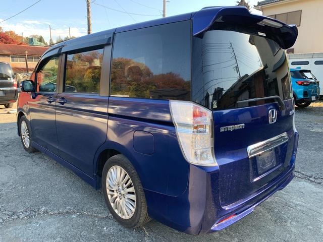 ステップワゴンスパーダ Ｚ　フリップダウンモニター　両側パワスラ横滑防止　イモビ　スマキー　フルフラットシート　バックモニタ－　キーフリー　パワーウィンド　ＥＴＣ付　運転席助手席エアバック　衝突安全ボディ　Ｗエアコン　ＰＳ（5枚目）