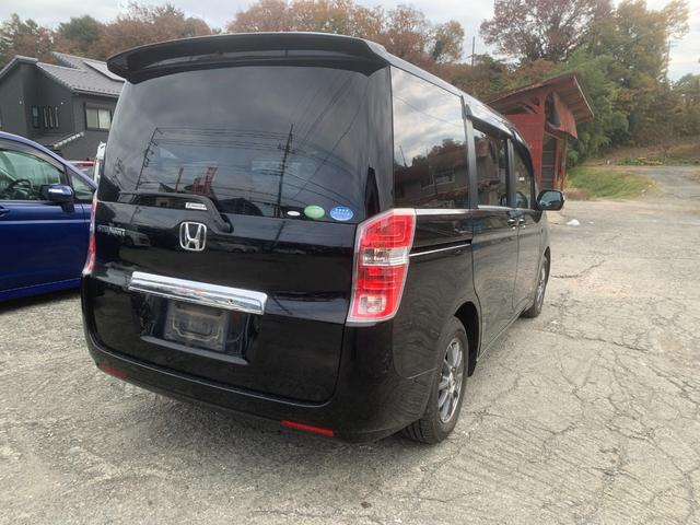 ステップワゴン Ｌ　リアエアコン　ＷＳＲＳ　パワーウインドウ　スマ－トキ－　キーレス　３列　衝突安全ボディ　フルフラットシート　盗難防止システム　パワーステアリング　バックモニ　ウォークスルー　運転席エアバック（3枚目）