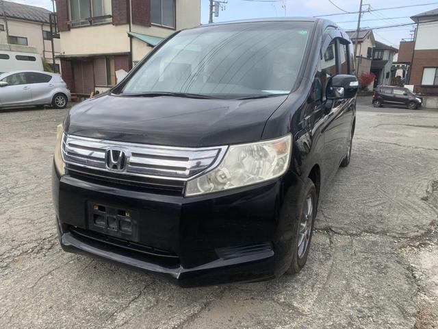 ステップワゴン Ｌ　リアエアコン　ＷＳＲＳ　パワーウインドウ　スマ－トキ－　キーレス　３列　衝突安全ボディ　フルフラットシート　盗難防止システム　パワーステアリング　バックモニ　ウォークスルー　運転席エアバック（7枚目）