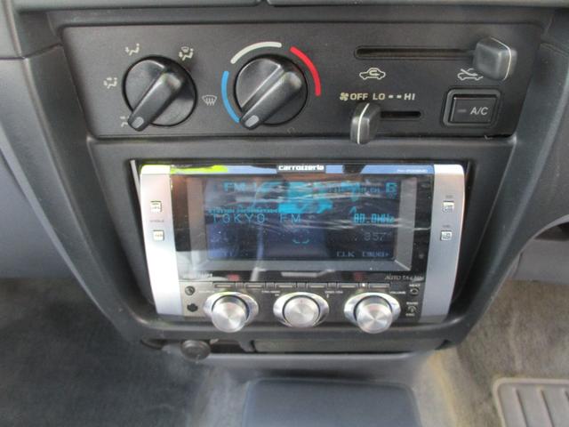 ハイラックススポーツピック エクストラキャブ　標準ボディ　１５インチアルミ　ＣＤデッキ　４ＷＤ　サンル－フ　サイドステップ（21枚目）