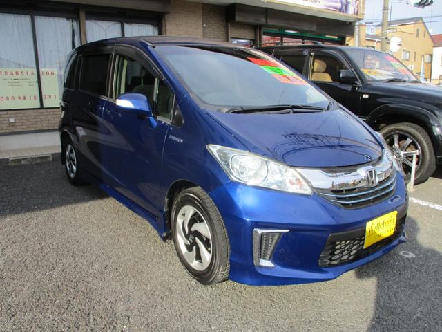 フリードハイブリッド ジャストセレクション フルエアロ 両側パワースライドドア HIDヘッドランプ リアモニター フルセグTV HDD ETC クルーズコントロール バックカメラ Bluetooth 取扱説明書 メンテナンスノート キーレス(6枚目)