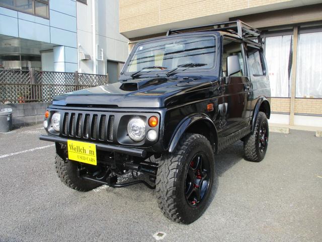 ジムニー ワイルドウインド　４ＷＤ　１６ＡＷ　タイヤ新品　スロットルボディ新品　社外イカリングヘッドライト　ルーフラック　縞鋼板サイドパネル　３インチリフトＵＰ　社外ステアリング　ＬＥＤテールランプ　縞鋼板タンクカバー　ＥＴＣ（5枚目）