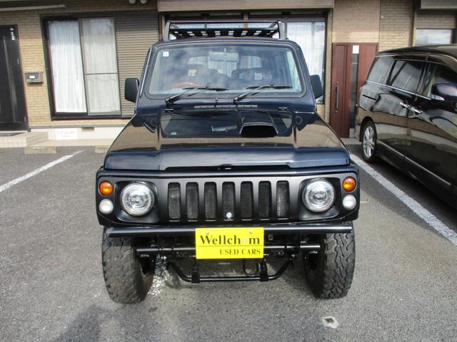 ジムニー ワイルドウインド　４ＷＤ　１６ＡＷ　タイヤ新品　スロットルボディ新品　社外イカリングヘッドライト　ルーフラック　縞鋼板サイドパネル　３インチリフトＵＰ　社外ステアリング　ＬＥＤテールランプ　縞鋼板タンクカバー　ＥＴＣ（6枚目）