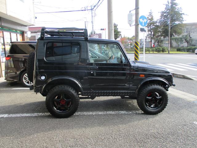 ジムニー ワイルドウインド　４ＷＤ　１６ＡＷ　タイヤ新品　スロットルボディ新品　社外イカリングヘッドライト　ルーフラック　縞鋼板サイドパネル　３インチリフトＵＰ　社外ステアリング　ＬＥＤテールランプ　縞鋼板タンクカバー　ＥＴＣ（8枚目）