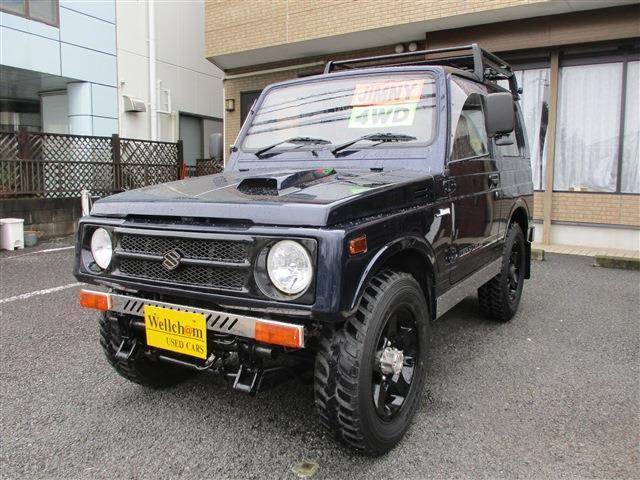 ジムニー ワイルドウインドリミテッド　４ＷＤ　１６ＡＷ　社外キーレス　純正ルーフラック　ＮＴＳ製　ステンレスサイドパネル　背面タイヤ　ＭＯＭＯステアリング　社外フロントバンパー（5枚目）