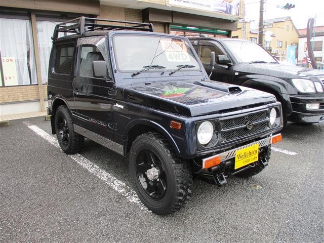 ジムニー ワイルドウインドリミテッド　４ＷＤ　１６ＡＷ　社外キーレス　純正ルーフラック　ＮＴＳ製　ステンレスサイドパネル　背面タイヤ　ＭＯＭＯステアリング　社外フロントバンパー（7枚目）