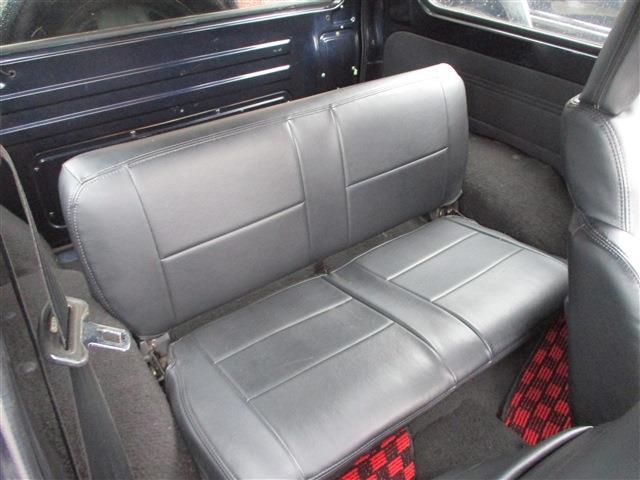 ジムニー ワイルドウインドリミテッド　４ＷＤ　１６ＡＷ　社外キーレス　純正ルーフラック　ＮＴＳ製　ステンレスサイドパネル　背面タイヤ　ＭＯＭＯステアリング　社外フロントバンパー（13枚目）