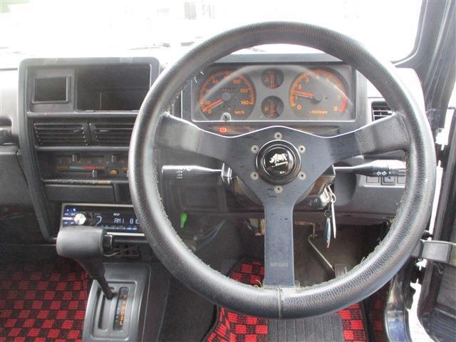 ジムニー ワイルドウインドリミテッド　４ＷＤ　１６ＡＷ　社外キーレス　純正ルーフラック　ＮＴＳ製　ステンレスサイドパネル　背面タイヤ　ＭＯＭＯステアリング　社外フロントバンパー（16枚目）