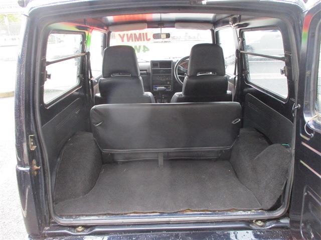 ジムニー ワイルドウインドリミテッド　４ＷＤ　１６ＡＷ　社外キーレス　純正ルーフラック　ＮＴＳ製　ステンレスサイドパネル　背面タイヤ　ＭＯＭＯステアリング　社外フロントバンパー（24枚目）