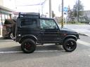 ジムニー ワイルドウインド　４ＷＤ　１６ＡＷ　タイヤ新品　スロットルボディ新品　社外イカリングヘッドライト　ルーフラック　縞鋼板サイドパネル　３インチリフトＵＰ　社外ステアリング　ＬＥＤテールランプ　縞鋼板タンクカバー　ＥＴＣ（8枚目）