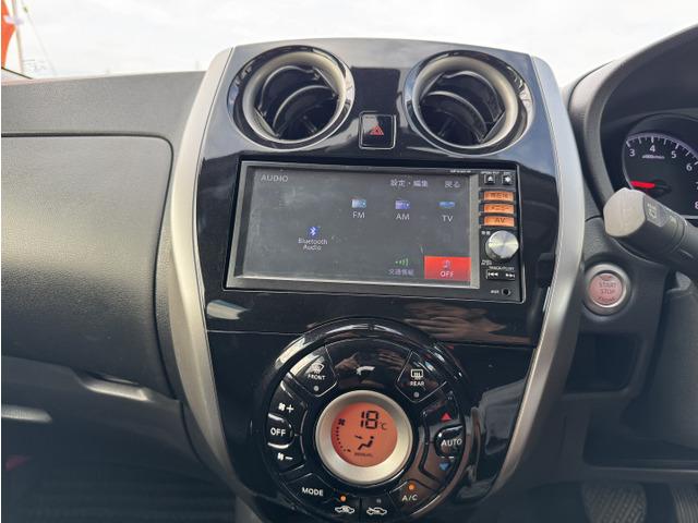 ノート Ｘ　Ｖセレクション＋セーフティ　ナビテレビ　運転席助手席エアバック　アイドリングストップ　キーレスエントリー　衝突安全ボディ　盗難防止システム　踏み間違い防止アシスト　横滑り防止機能　エアバッグ　ＡＢＳ　ＡＡＣ　パワーウィンドウ（12枚目）